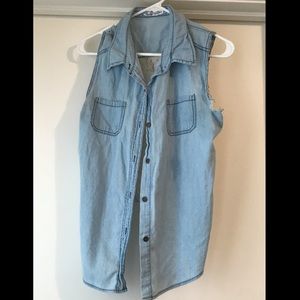 Distressed jean vest with lace